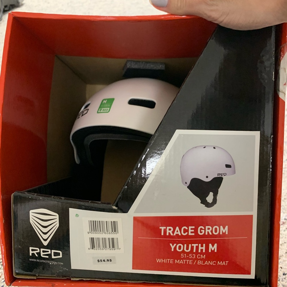 Red snowboarding/skiing helmet
